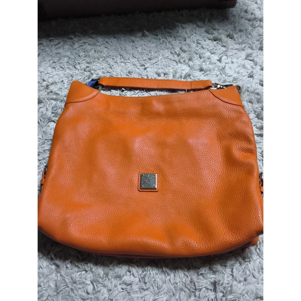 34.Dooney & Bourke Orange Pebbled Leather Hobo Shoulder Bag Silver Hardware